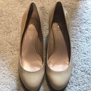 Tan patent leather pumps